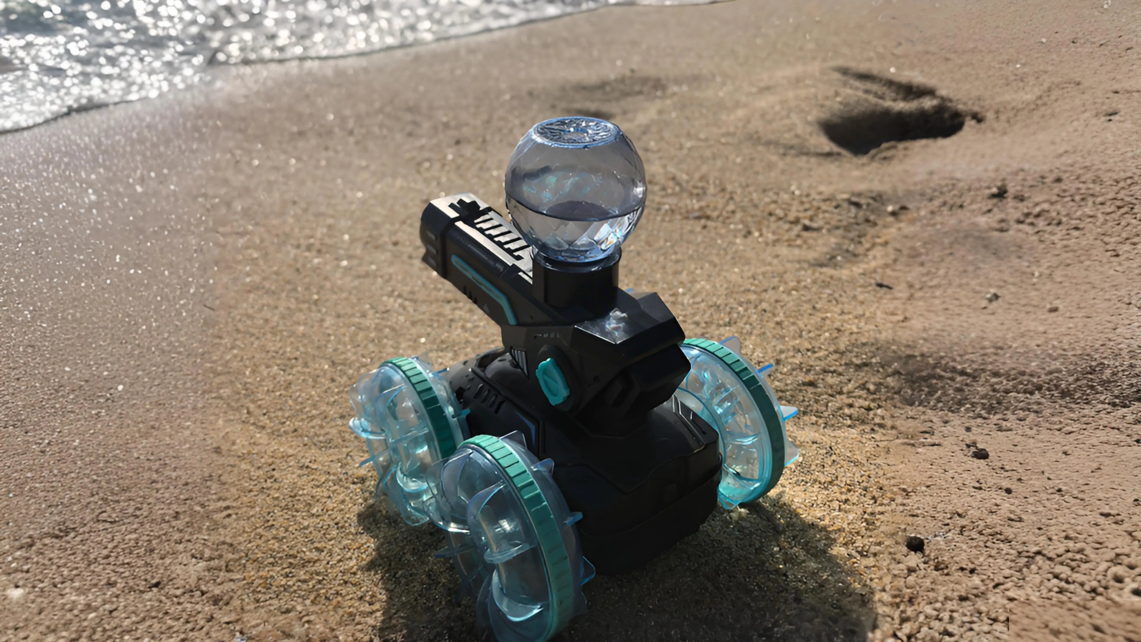 An Amphibious RC Car​ parked on a sandy beach, showcasing its multi-terrain capability for sand and shallow water play.
