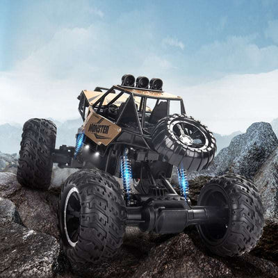 PLAYPULSE wireless remote control off-road car with large tires and rugged design climbing rocky terrain